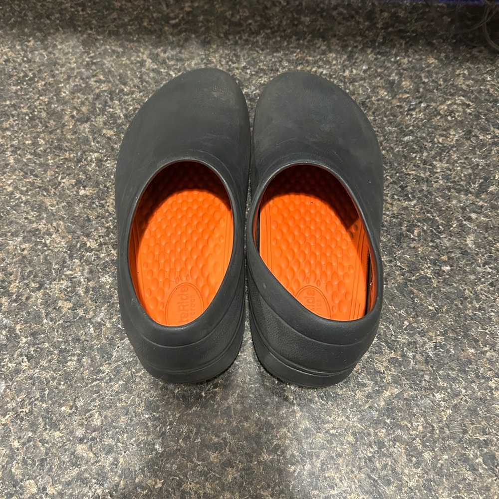 Black Slip-On Crocs on the clock Literide work clogs unisex
